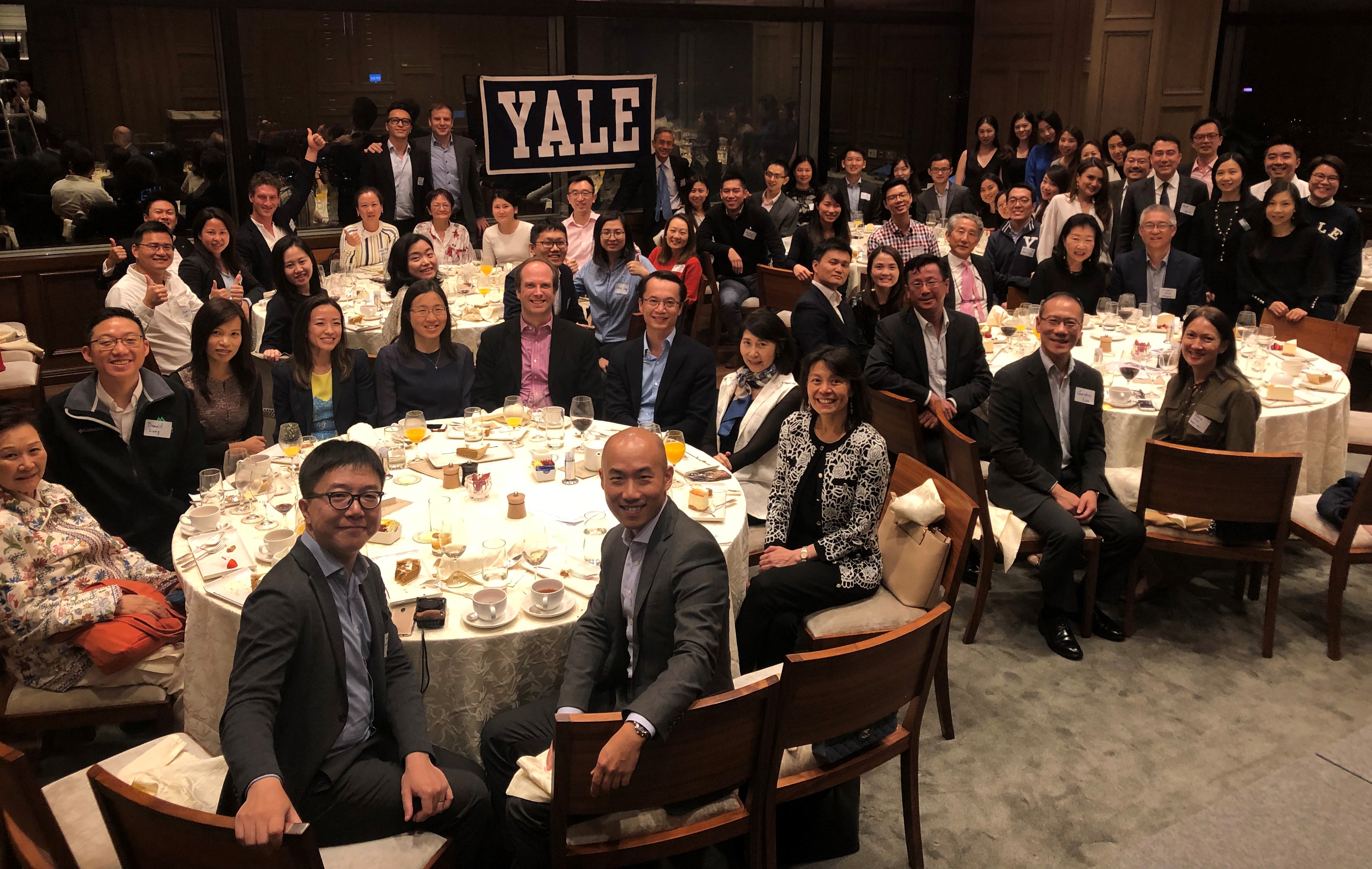 Alumni gather during Thanksgiving dinner with the Yale Club of Hong Kong.