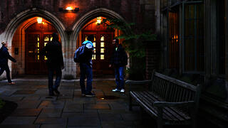 Students gather outside one of Yale's residential colleges.